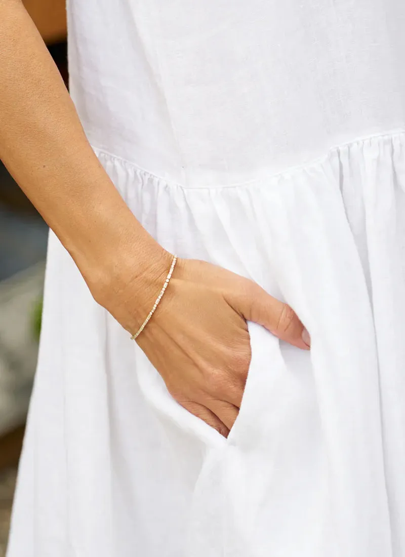 Daphne Sleeveless Popover Dress